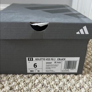 Adidas Golettos Black Cleats brand new- girls size 6